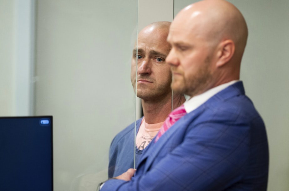 caption: Joseph David Emerson, left, 44, was arraigned in Multnomah County Circuit Court on Oct. 24, 2023, in Portland, Ore. The former Alaska Airlines pilot who police say tried to cut the engines while riding in the cockpit jump seat during a Horizon Air flight made his first appearance in federal court in Portland on Thursday, Oct. 26, 2023.