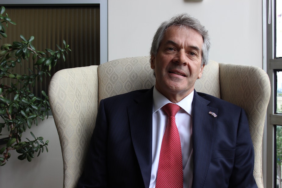 caption: British Ambassador Sir Peter Westmacott in the KUOW offices, May 2015.