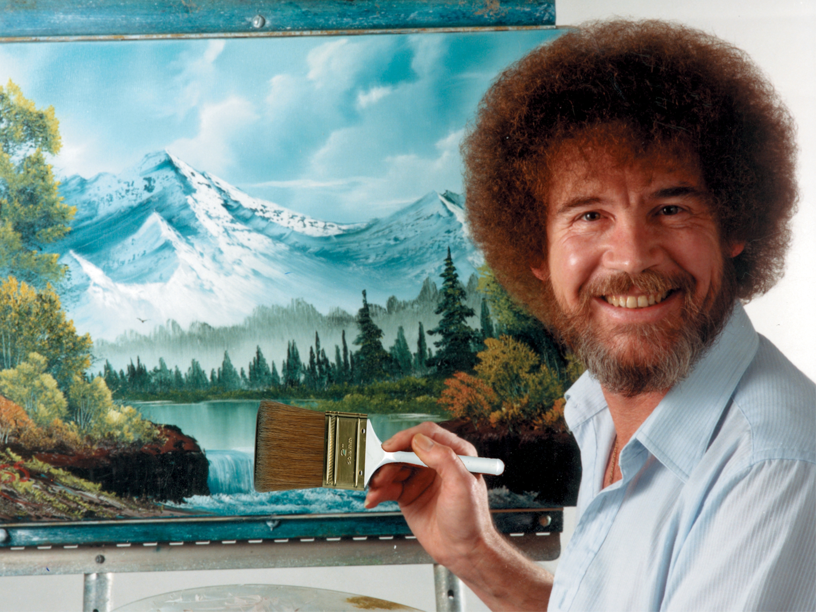 caption: The late Bob Ross encouraged millions of Americans to make and appreciate art through his show <em>The Joy of Painting</em>, which has aired on PBS stations since 1983.