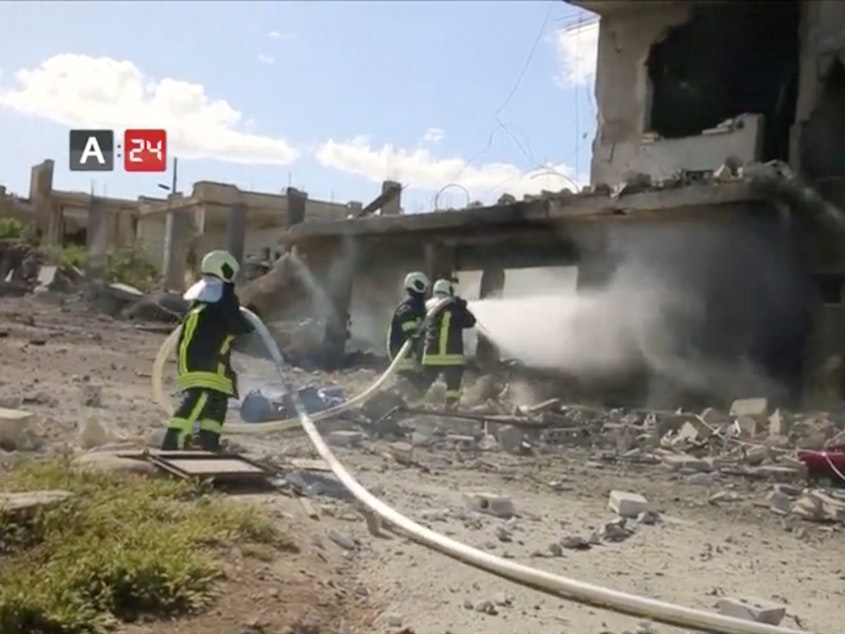 caption: On May 6, an air strike destroyed Nabd Al-Hayat hospital in Syria's Idlib province.