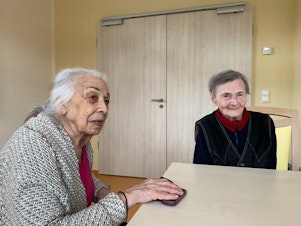 caption: Alla Ilyinichna Sinelnikova (left), 90, and Sonya Leibovna Tartakovskaya, 83, were recently evacuated from Ukraine to Germany. Both are survivors of the Holocaust, and this is the second time they are fleeing war. "I never thought I would live to see such horror for the second time in my life," says Sinelnikova. "I thought it was in my past, all over and done with. And now we're reliving it."