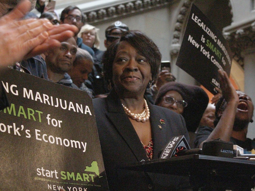 caption: Assemblywoman Crystal Peoples-Stokes, a Democrat who represents Buffalo, speaks at a rally for marijuana legalization at the New York state Capitol in Albany on Jan. 28, 2020.