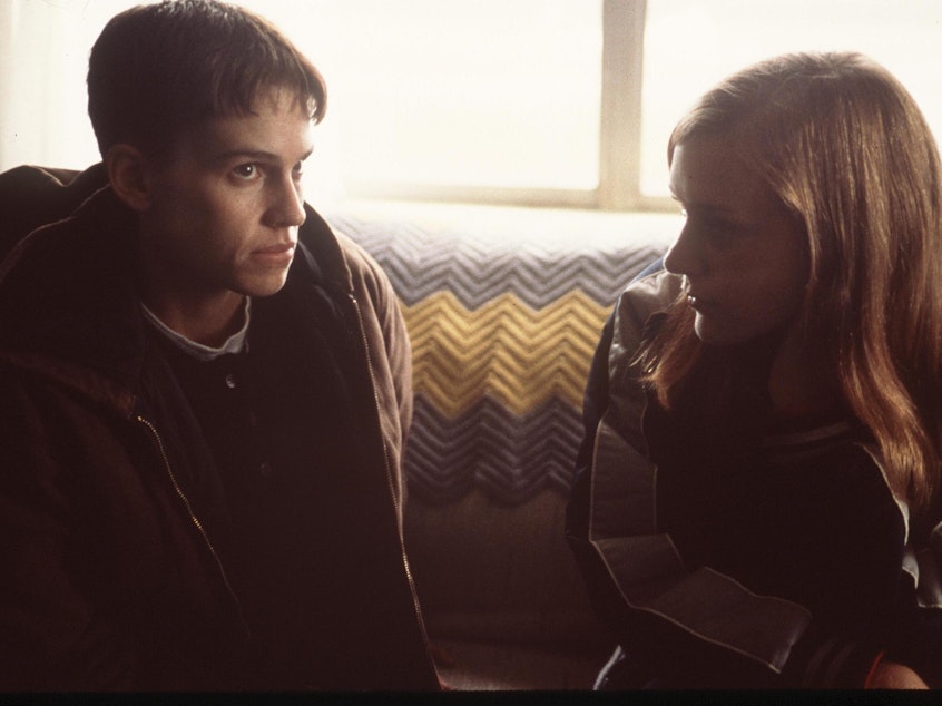 caption: Hilary Swank (left) and Chloe Sevigny starred in <em>Boys Don't Cry</em>, a fictionalized portrayal of the transgender youth Brandon Teena (played by Swank).