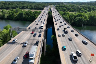 caption: More than 50 million Americans are expected to travel at least 50 miles from home over the upcoming July Fourth weekend. Traffic in Austin, Texas, is seen here in April.