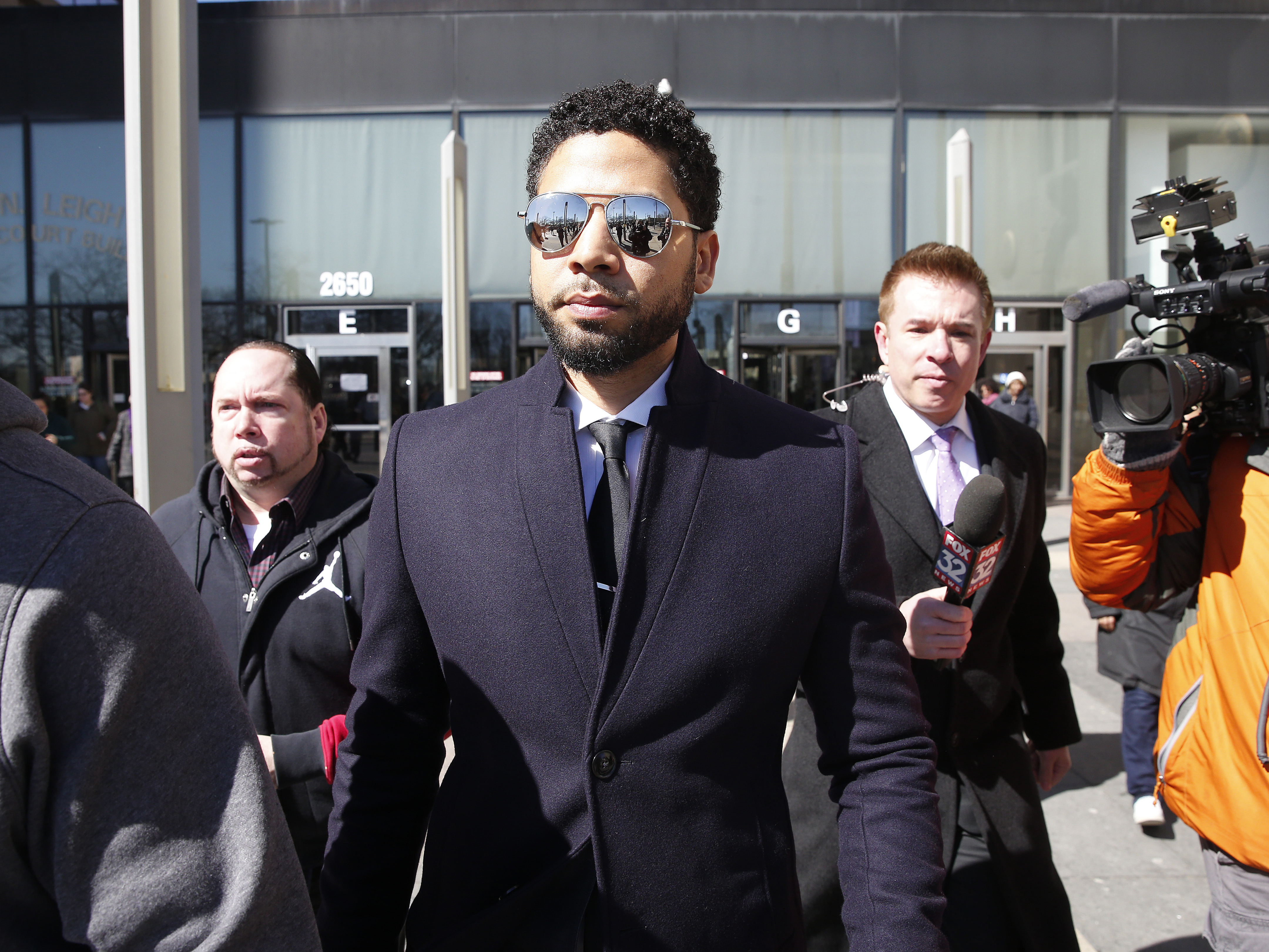 caption: Actor Jussie Smollett leaves a courthouse last month in Chicago. On Thursday, the city sued him to recoup costs of a police investigation that followed what the city says was his false report that he'd been attacked.