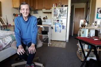 caption: Victoria Marshall is one of hundreds of seniors who live in subsidized senior housing just off Aurora. She has a view of the lake, but says she feels profoundly disconnected from civic and cultural life.