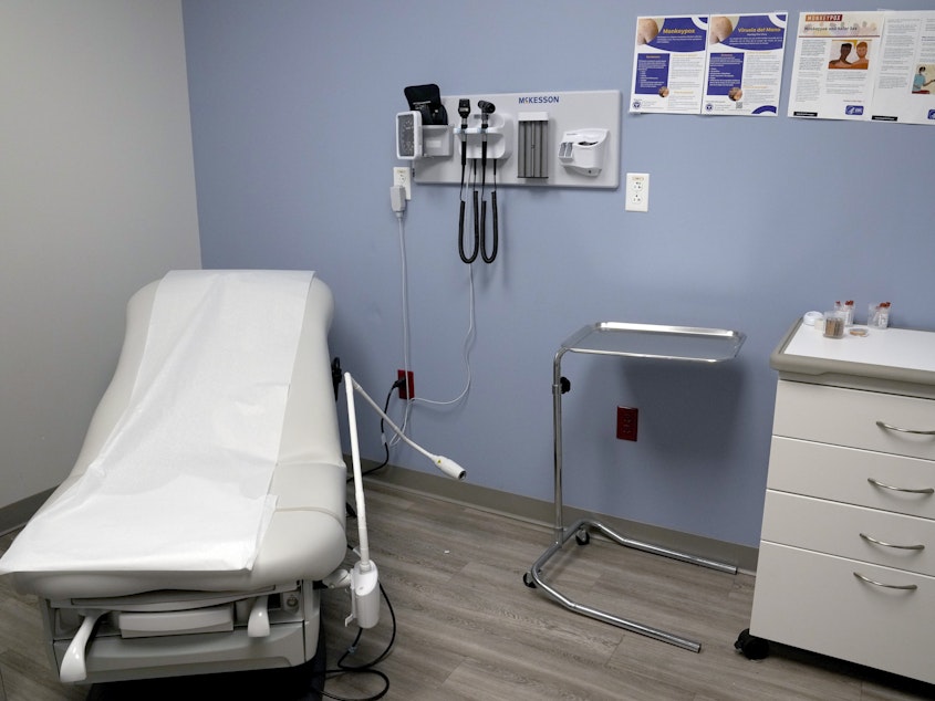 caption: An exam room is seen inside Planned Parenthood in March 2023. Republican attorneys general from 17 states filed a lawsuit on Thursday, challenging new federal rules entitling workers to time off and other accommodations for abortions, calling the rules an illegal interpretation of a 2022 federal law.