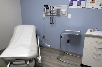 caption: An exam room is seen inside Planned Parenthood in March 2023. Republican attorneys general from 17 states filed a lawsuit on Thursday, challenging new federal rules entitling workers to time off and other accommodations for abortions, calling the rules an illegal interpretation of a 2022 federal law.