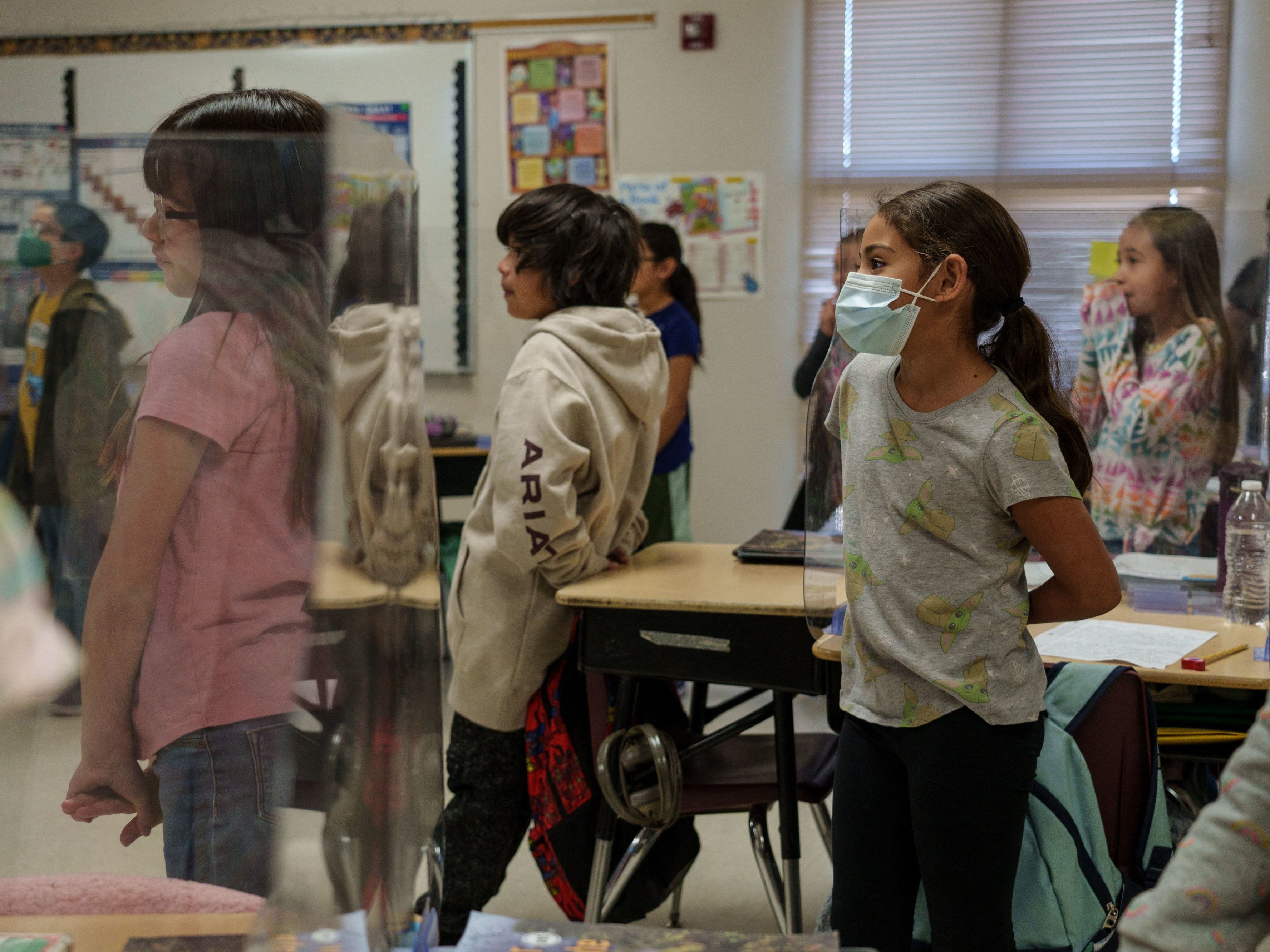 caption: Third grade students participate in class at Highland Elementary School in Las Cruces, N.M., in the spring.