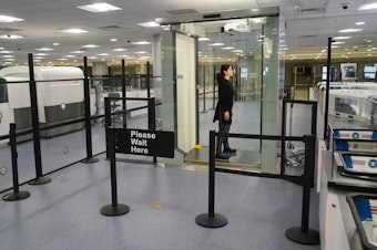 caption: Passengers at the Harry Reid International Airport in Las Vegas will be the first to use the new system, which has been compared to the self-checkout at a grocery store.