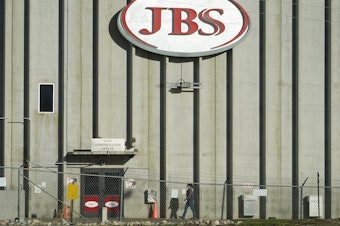 caption: The meatpacking company JBS confirms it paid an $11 million ransom to hackers who targeted its U.S. and Australia operations.