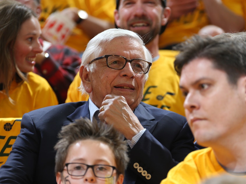 caption: Former NBA Commissioner David Stern attends a game between the Houston Rockets and the Utah Jazz during the Western Conference Semifinals in 2018. Stern died Wednesday at the age of 77.