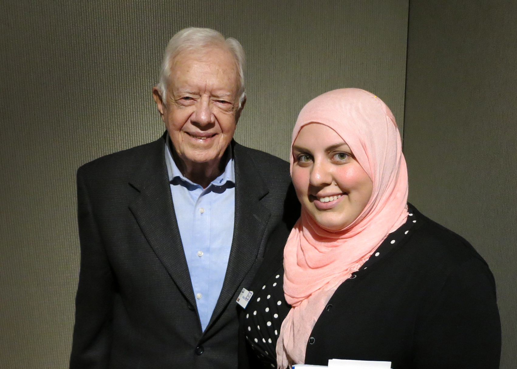 caption: Former President Jimmy Carter in the KUOW studios in Seattle with producer Amina Al-Sadi on March 31, 2014.