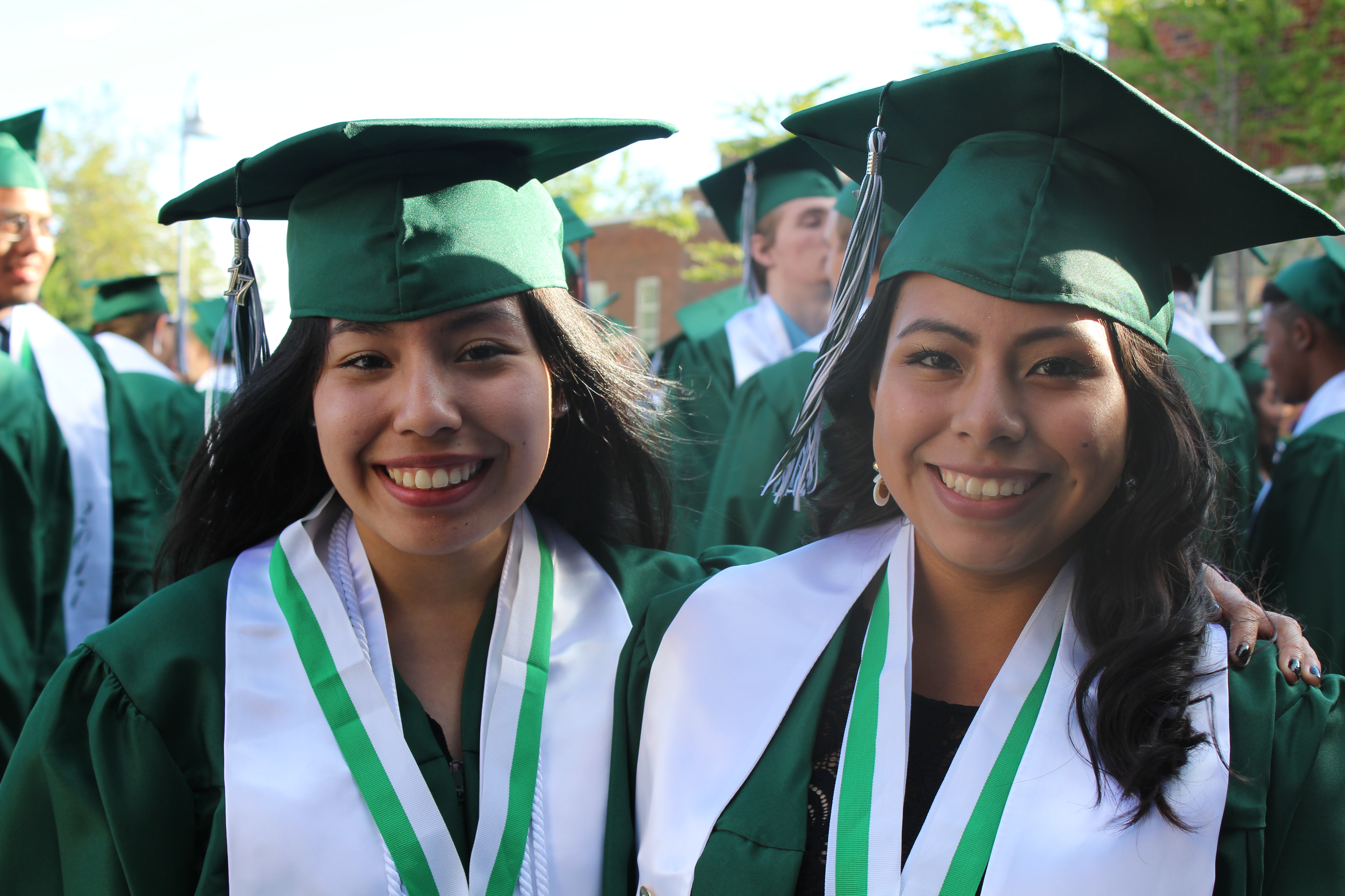 caption: Floresita Gomez-Guzman and Rosa Mendoza are migrant students graudating from Mt. Vernon High School