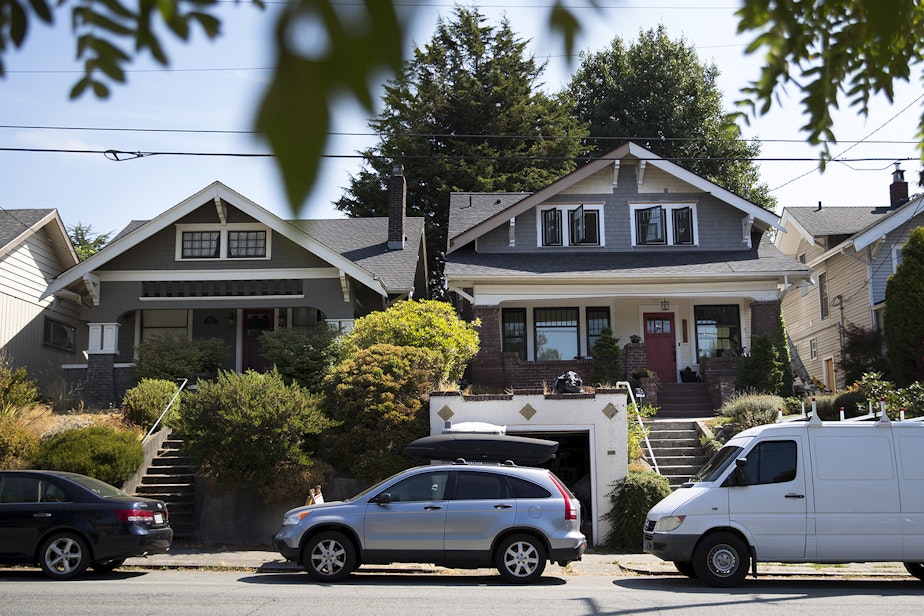 caption: Homes are shown on Wallingford Ave. N., on Friday, August 18, 2017, in Wallingford.