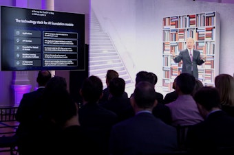 caption: Microsoft President Brad Smith speaking at an event in Washington D.C. 
