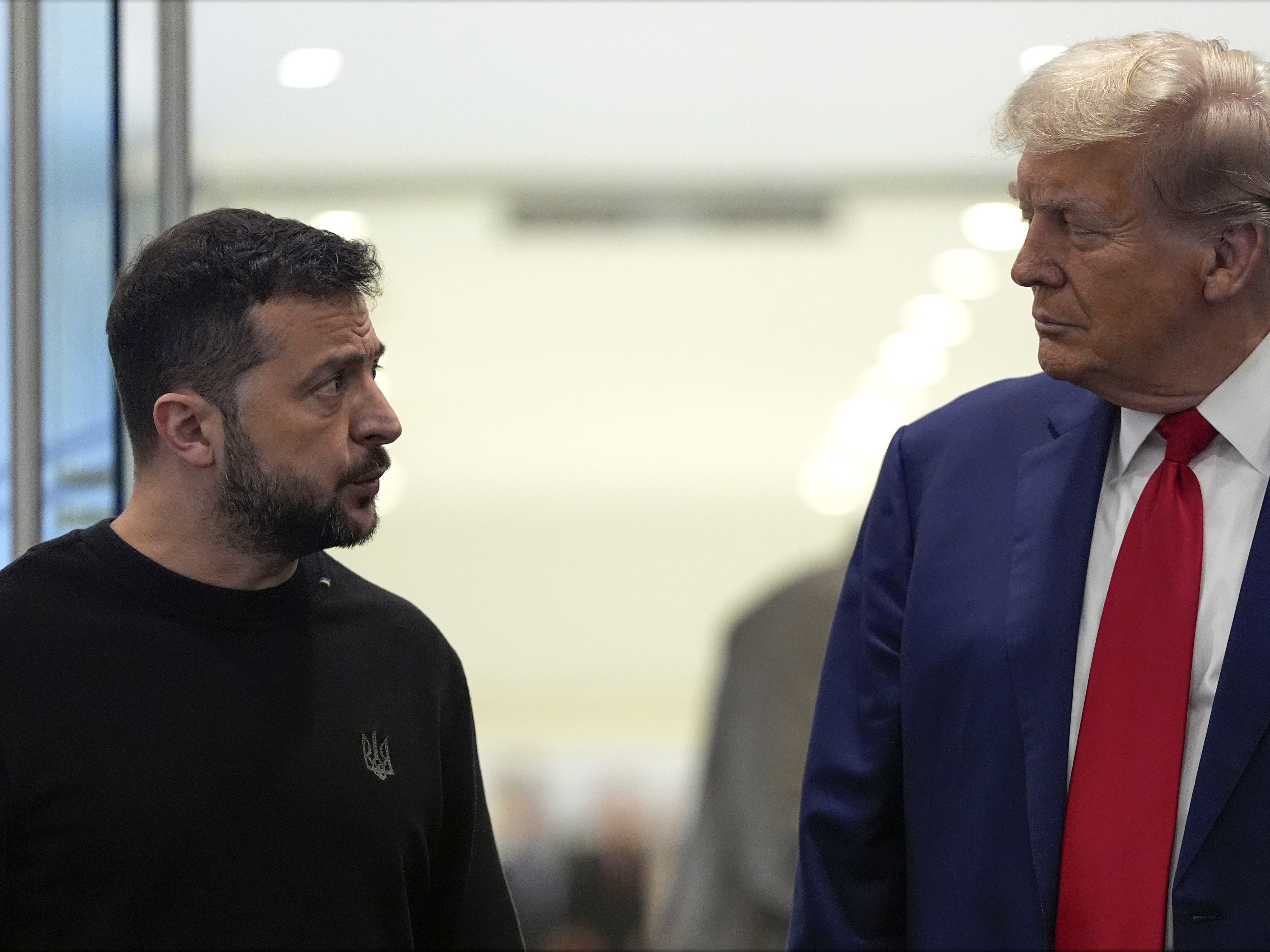 caption: Then-candidate Donald Trump meets with Ukraine's President Volodymyr Zelenskyy at Trump Tower, on Sept. 27, in New York.
