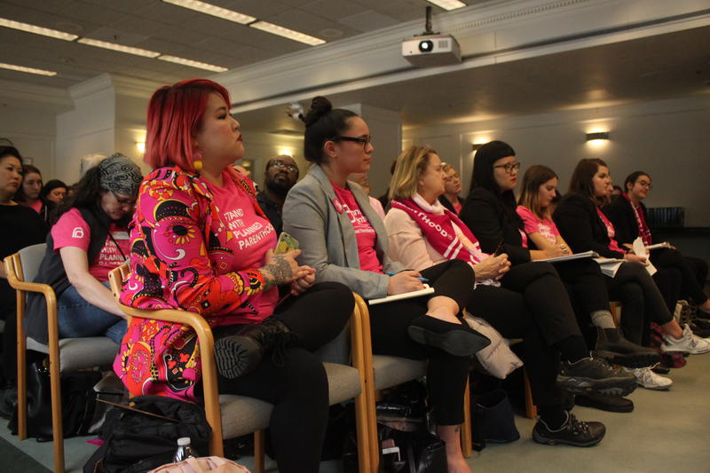 caption: Planned parenthood advocates listen as students speak in favor of legislation mandating consent-based sex education in Washington state, Wednesday, Feb. 13, 2019.CREDIT: MAX WASSERMAN/N3