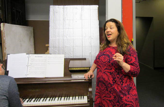 caption: Sarah Rudinoff at the piano at On The Boards.