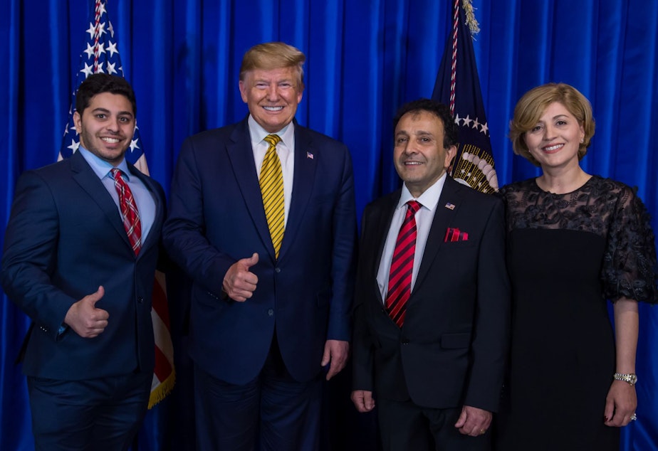 caption: Hossein Khorram (second from left) with his family and President Trump, Sept. 17, 2019 in Los Angeles. 