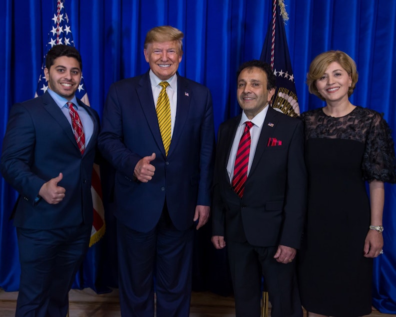 caption: Hossein Khorram (second from left) with his family and President Trump, Sept. 17, 2019 in Los Angeles. 
