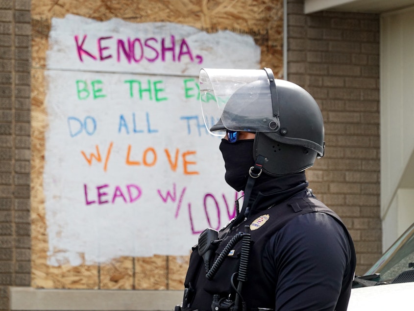 caption: Police prepare for President Trump's visit on Sept. 1, 2020 to Kenosha, Wis. Claims have been filed against Kenosha city and county, arguing the police and sheriff's department were negligent in their handling of protests on Aug. 25 in which three men were shot.