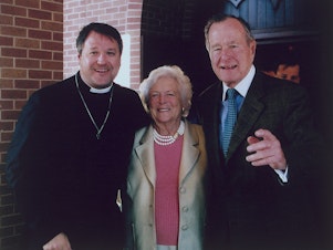 caption: Rev. Russell Levenson, Jr. of St. Martin's Episcopal Church in Houston with former first lady Barbara Bush and former President George. H.W. Bush after a morning worship service. Levenson details his friendship with the Bushes and what he learned from them and how they lived their faith in his new book <em>Witness to Dignity: The Life and Faith of George H.W. and Barbara Bush.</em>