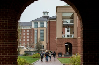 caption: Students walk across Liberty University's campus in Lynchburg, Va.