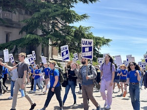 caption: University of Washington student teaching and research assistants went on strike Tuesday. They're fighting for wage increases.