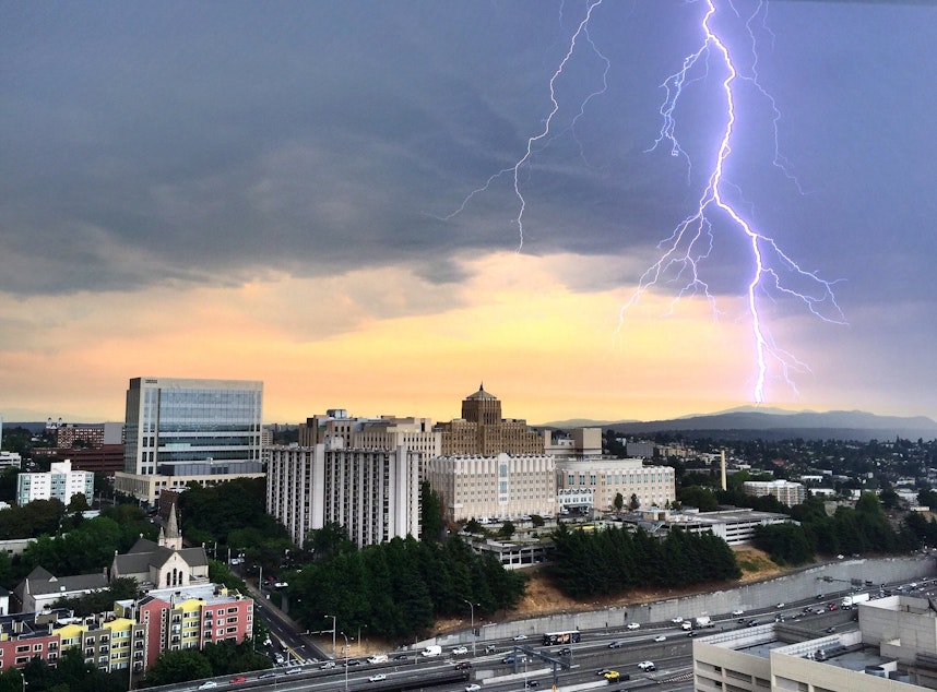 caption: The photographer who posted this to Flickr said this was a rare 2015 thunderstorm over Seattle, with Harborview Medical Center in the foreground.