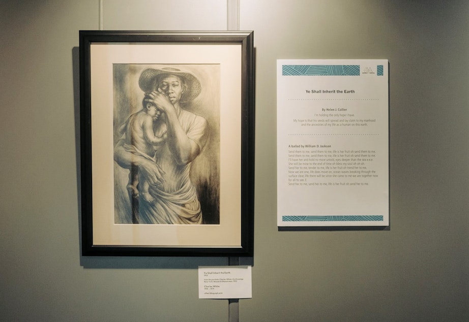caption: A print of Charles White's "Ye Shall Inherit the Earth" is featured in Seattle Public Library's "Black Activism in Print" exhibit.