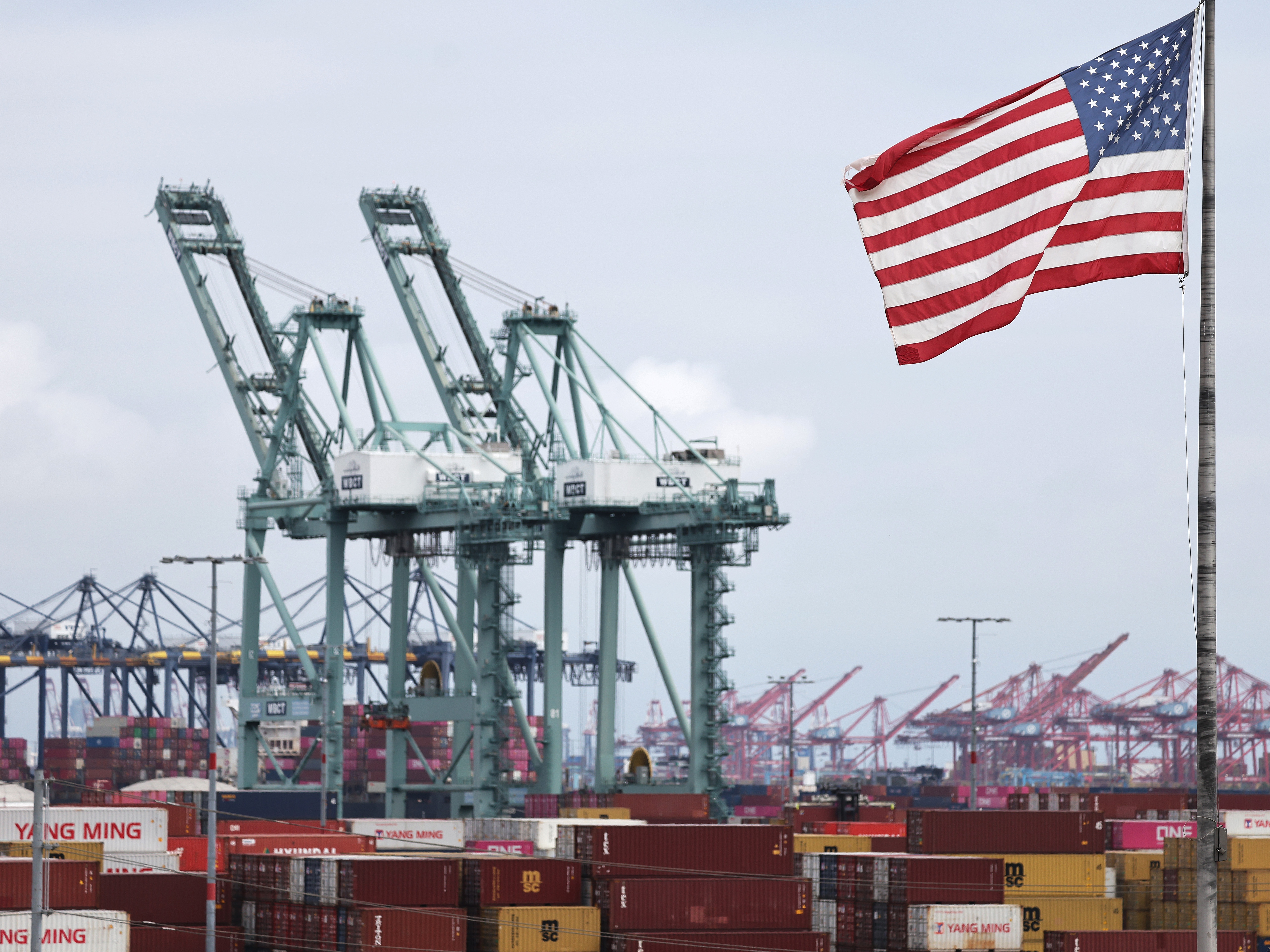 caption: The Port of Los Angeles is a major gateway to the U.S. for cargo coming from Asia.  But imports from China have dropped this year in response to President Trump's tariffs.