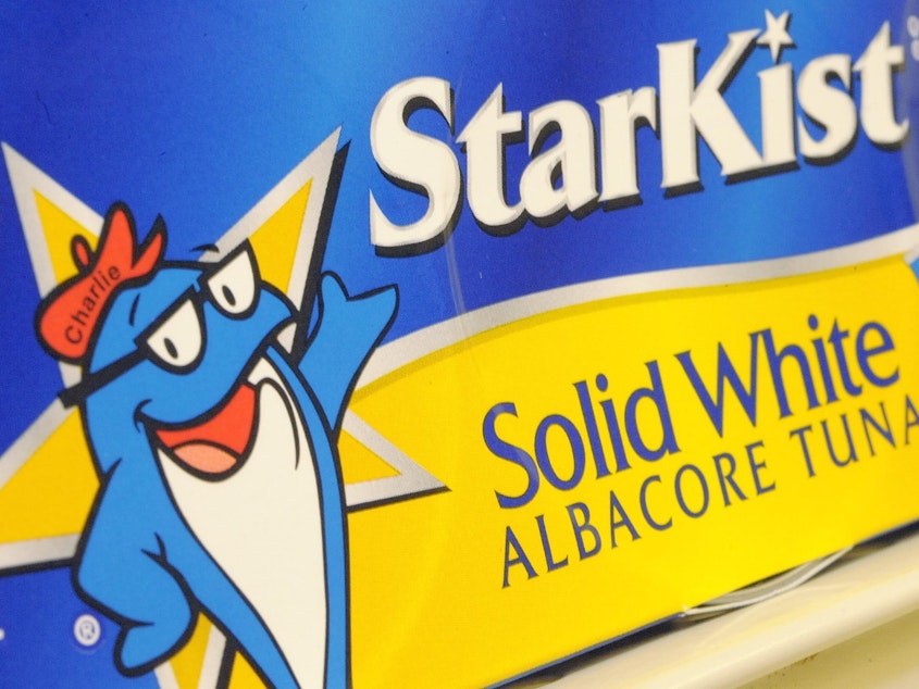 caption: A StarKist brand product is seen on a grocery store shelf. Authorities say StarKist has agreed to plead guilty to price fixing as part of a broad collusion investigation of the industry.