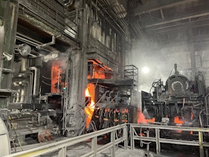 caption: Nucor makes steel sheets and beams at its plant in Berkeley County, S.C.
