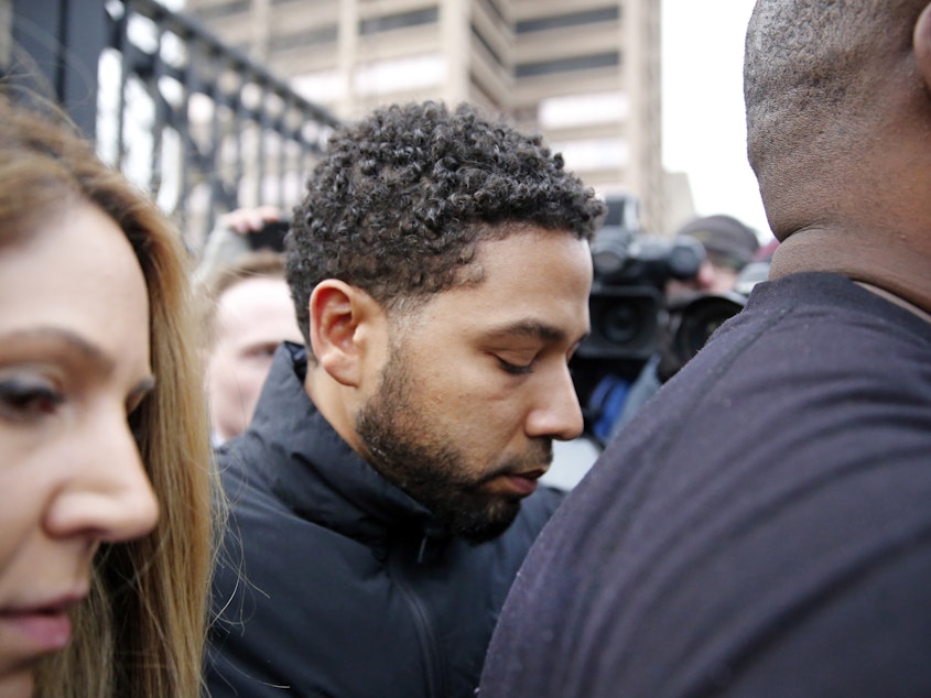 caption: <em>Empire</em> actor Jussie Smollett leaves the Cook County Jail in Chicago Thursday after posting bond. On Friday, the show's producers announced that they would be removing his character from the final episodes of this season.
