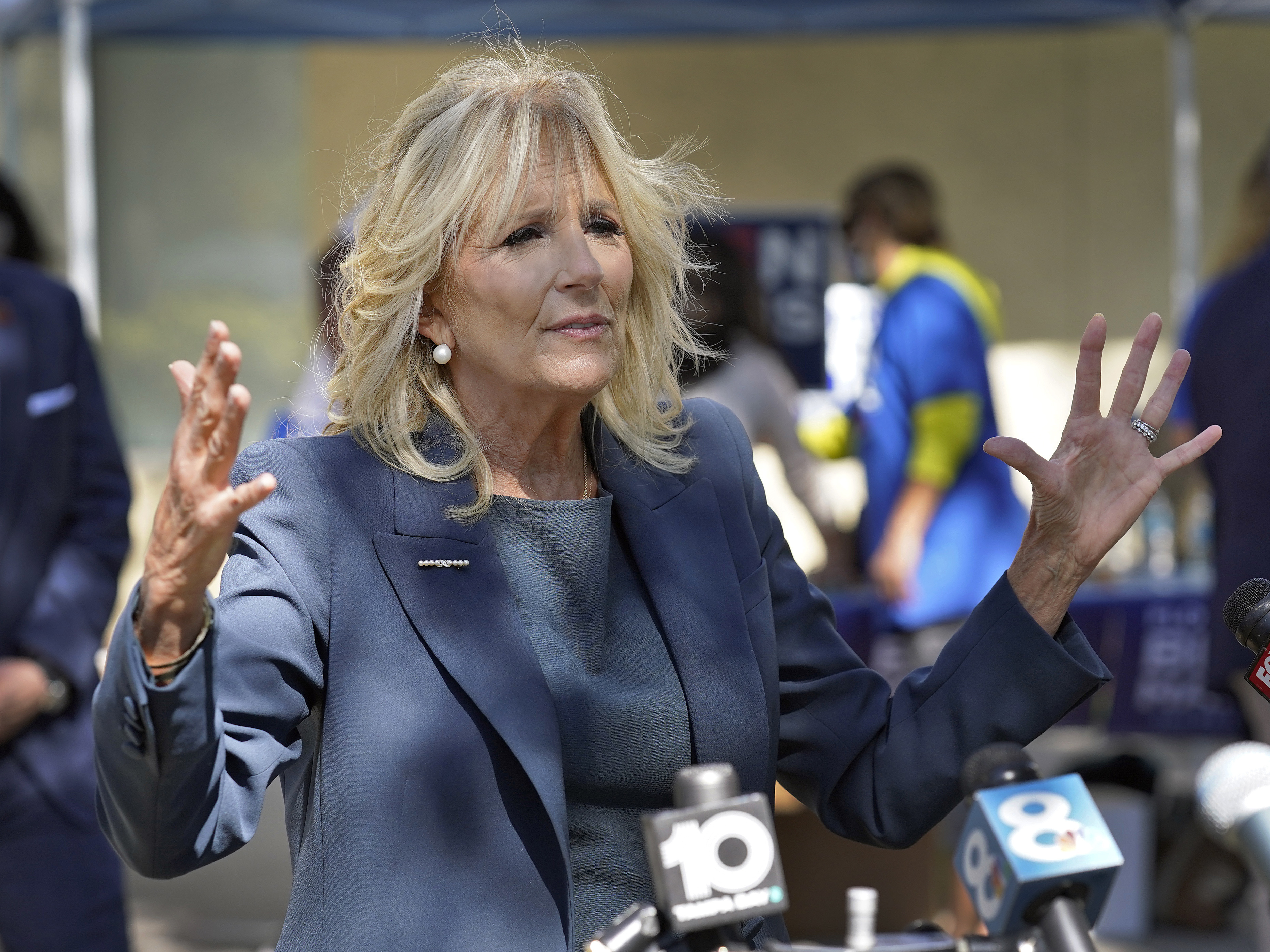 caption: Jill Biden, shown on the campaign trail in Nov. 2020, holds two master's degrees and a doctorate in education. An op-ed published in <em>The Wall Street Journal</em> asking her to stop using the title "Dr." has prompted widespread backlash.