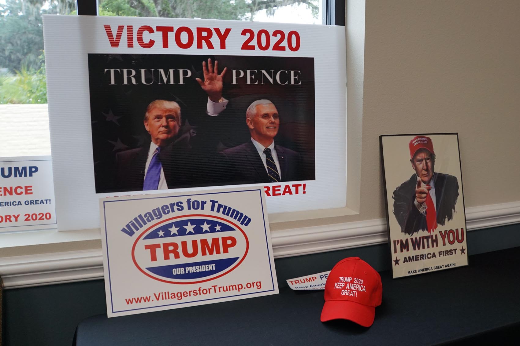 caption: Pro-Trump merchandise adorns the recreation center where leaders of several Republican clubs hold meetings in The Villages, a retirement town in central Florida north of Orlando, on June 12, 2019. (Leila Macor/AFP/Getty Images)