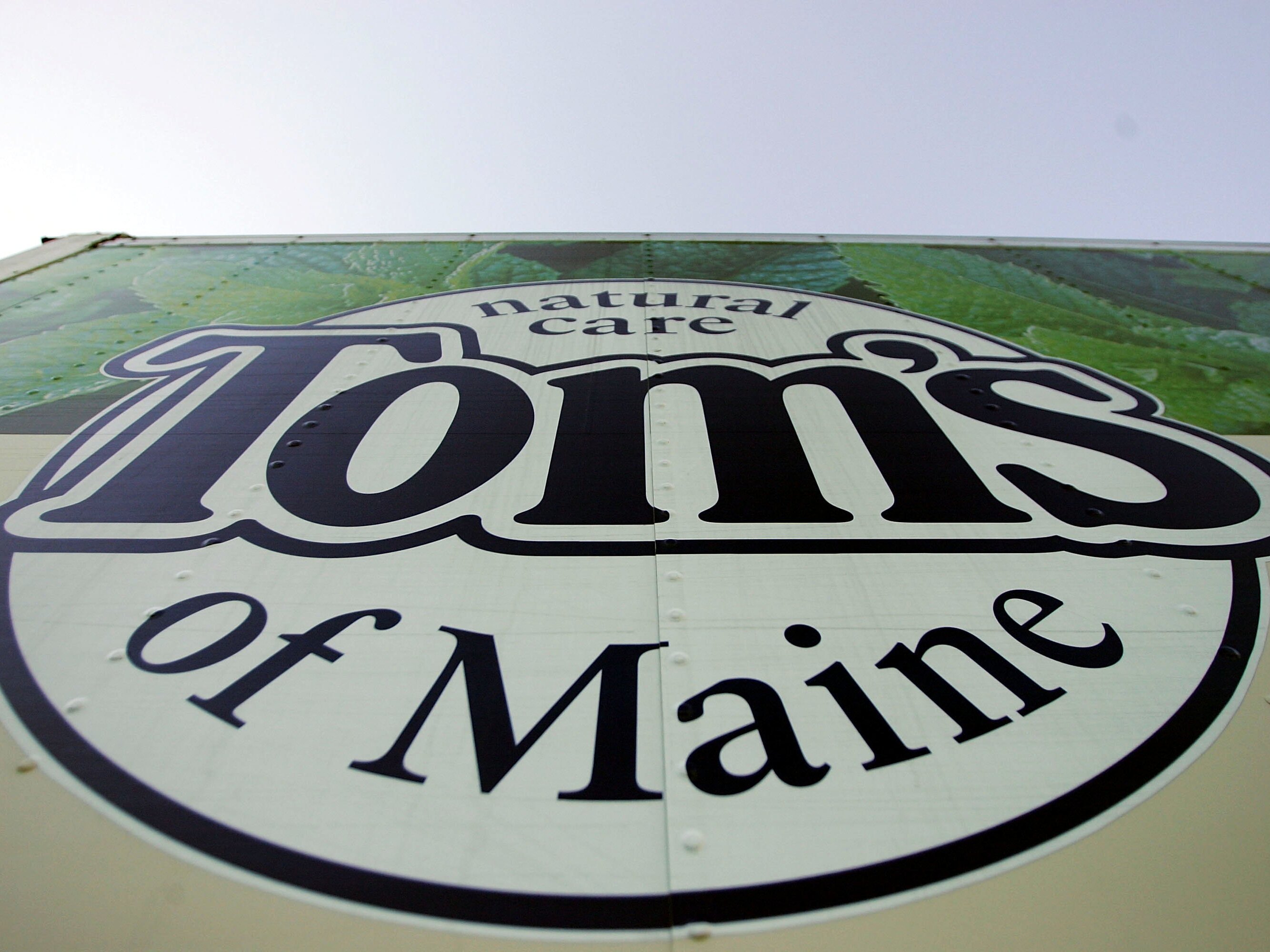 caption: A Tom's of Maine sign is seen at the manufacturing plant in Sanford, Maine, on March 28, 2006.