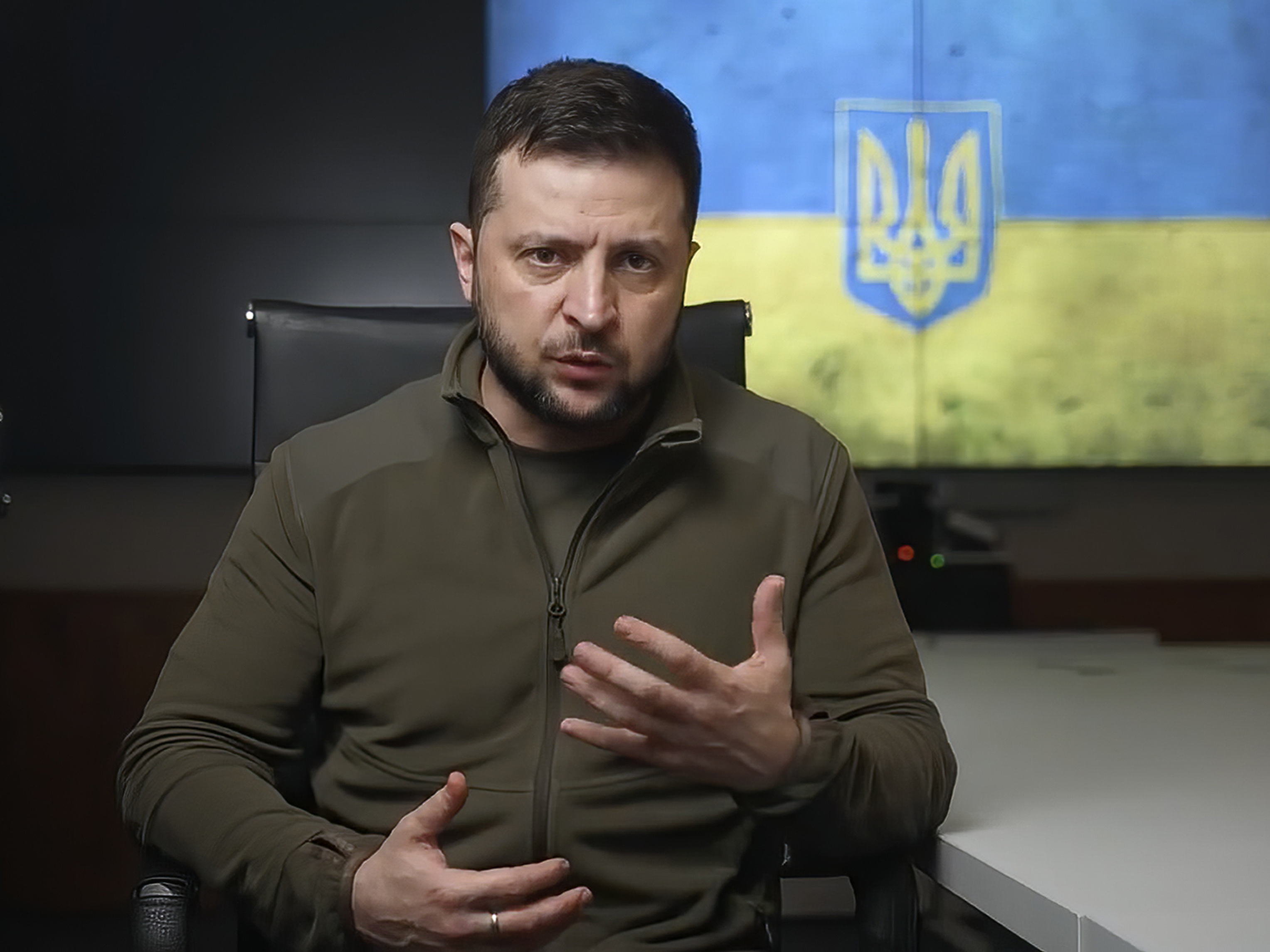 caption: Ukrainian President Volodymyr Zelenskyy is seen speaking from Kyiv in a pre-taped video presented at the Grammy Awards on Sunday.