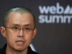 caption: Binance Co-Founder and CEO Changpeng Zhao, widely known as CZ, speaks during a press conference at the Europe's largest tech conference, the Web Summit, in Lisbon on Nov. 2, 2022. The SEC sued Binance and CZ on Monday, saying the company misled customers among other charges.