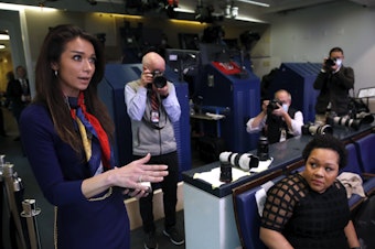 caption: One America News White House Correspondent Chanel Rion asks a question of President Donald Trump during a briefing about the coronavirus in April 2020. DirecTV isn't renewing the network's contract.
