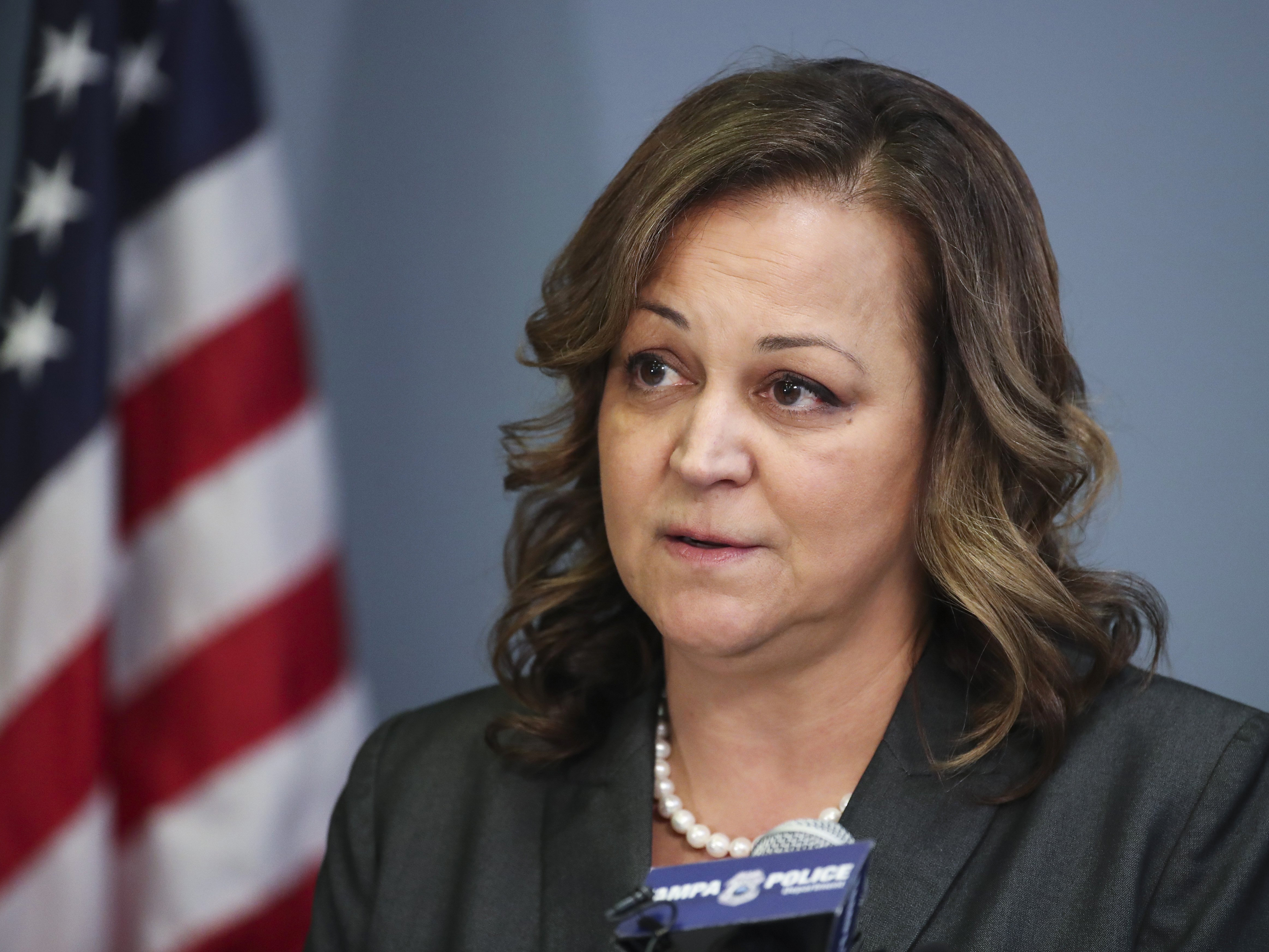 caption: Mary O'Connor, pictured here addressing reporters during a news conference at Tampa Police headquarters in February, resigned after using her position to escape a ticket during a traffic stop.