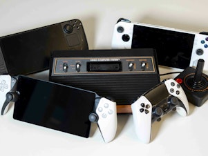 caption: From left to right, top to bottom: the Steam Deck OLED, ASUS Rog Ally, Atari 2600+, PlayStation Portal, and DualSense Edge Controller.