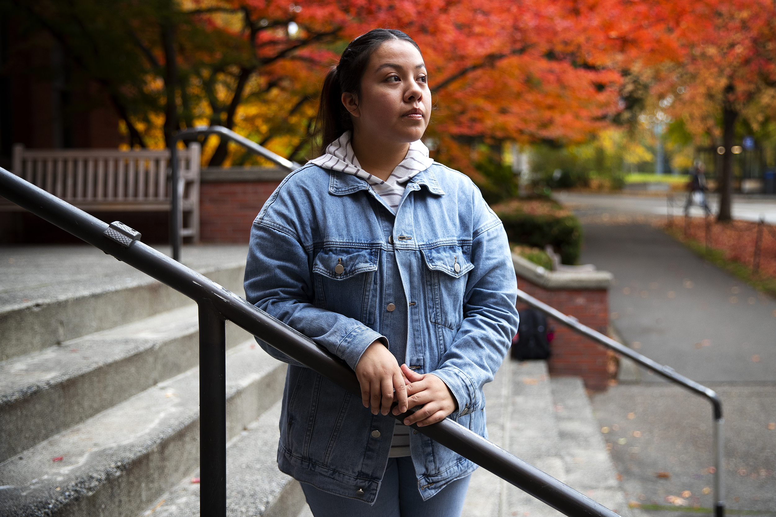 caption: Xitlaly Mendoza, a senior at UW, is portrayed on Monday, November 3, 2025, on the University of Washington campus in Seattle. 