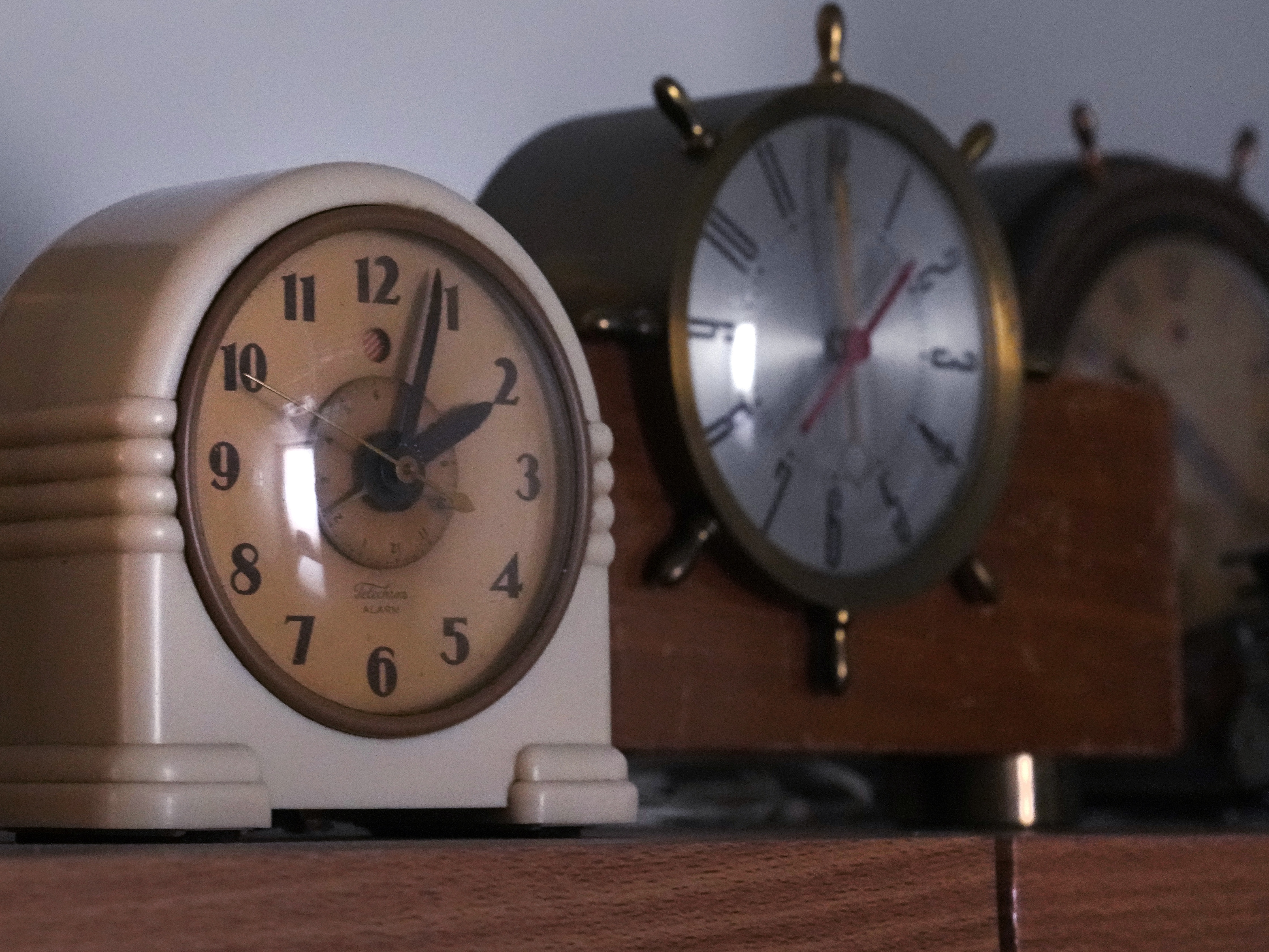 caption: Vintage clocks, seen here at the Electric Time Company in Medfield, Mass., will need a reset to reflect Sunday's time change.