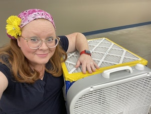 caption: Hillary Creech, of Jonesboro, Ark., built a DIY air purifier for her husband's classroom. "My husband's classroom in particular has a wall full of windows, none of which open," she said