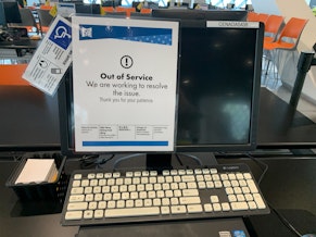 caption: A computer at the Seattle Public Library's central branch on June 5, 2024. A cyberattack on May 25 took out most of the library's digital systems. 