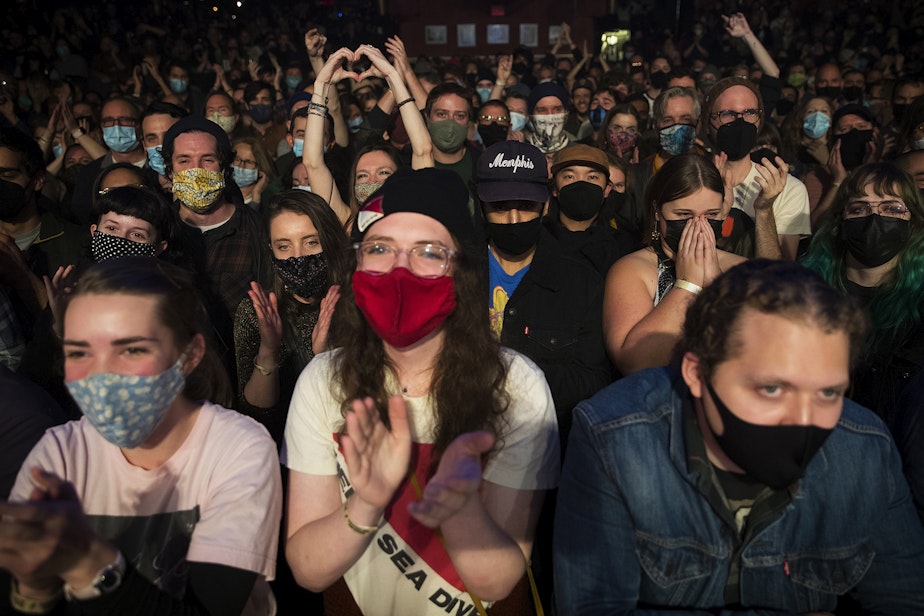 caption: Fans of Deep Sea Diver cheer as the band walks onto the stage before performing on Friday, November 12, 2021, at Showbox in Seattle.