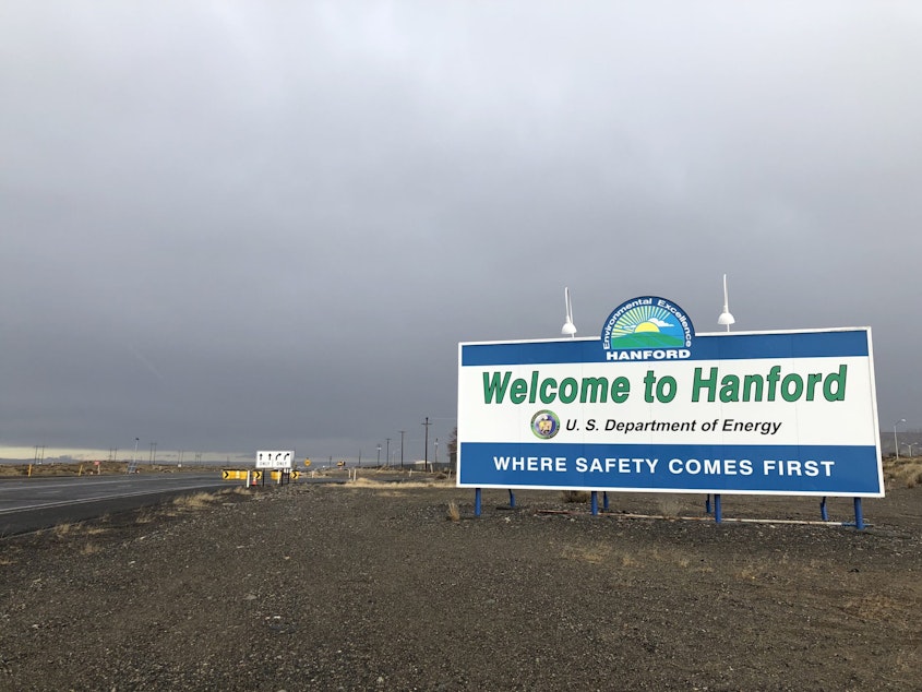 caption: File photo. A new sign graces the entrance onto the Hanford site near Richland, Wash.