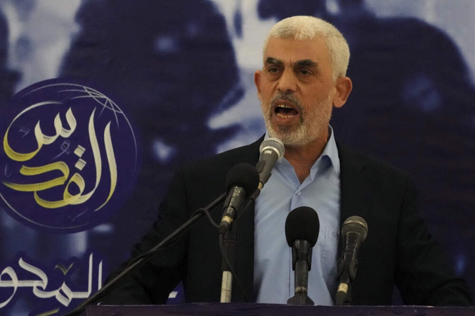 caption: Yahya Sinwar, head of Hamas in Gaza, delivers a speech during a meeting with people at a hall on the sea side of Gaza City, Saturday, April 30, 2022. (Adel Hana/AP)